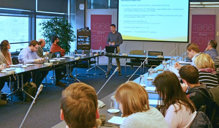 speaker presenting in front of an audience