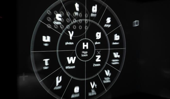 Une projection représentant des particules élémentaires, avec le boson de Higgs au centre, visible à l'Organisation européenne pour la recherche nucléaire (Cern), le 19 avril 2023 à Genève