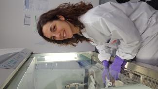 Clara Berenguer in lab coat