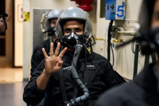 Photo prise et diffusée le 4 octobre 2024 par la société aérospatiale privée Axiom Space, de l'astronaute indien Shubhanshu Shukla, membre de l'équipage Ax-4, lors d'un entraînement au Johnson Space Center (JSC) de la NASA à Houston, au Texas